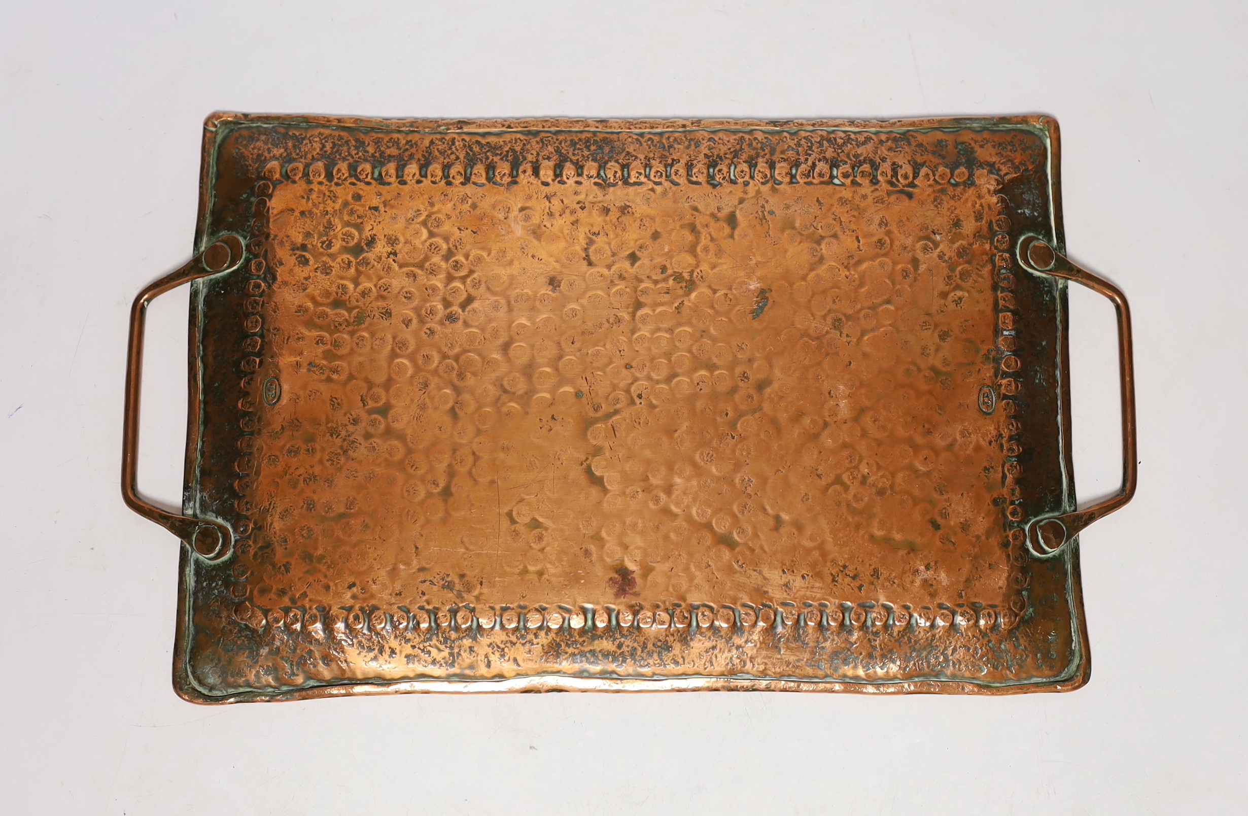 A John Pearson Arts & Crafts planished copper tray, 34cm wide